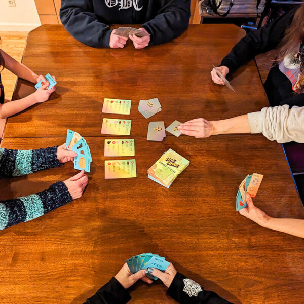 Family playing a card game